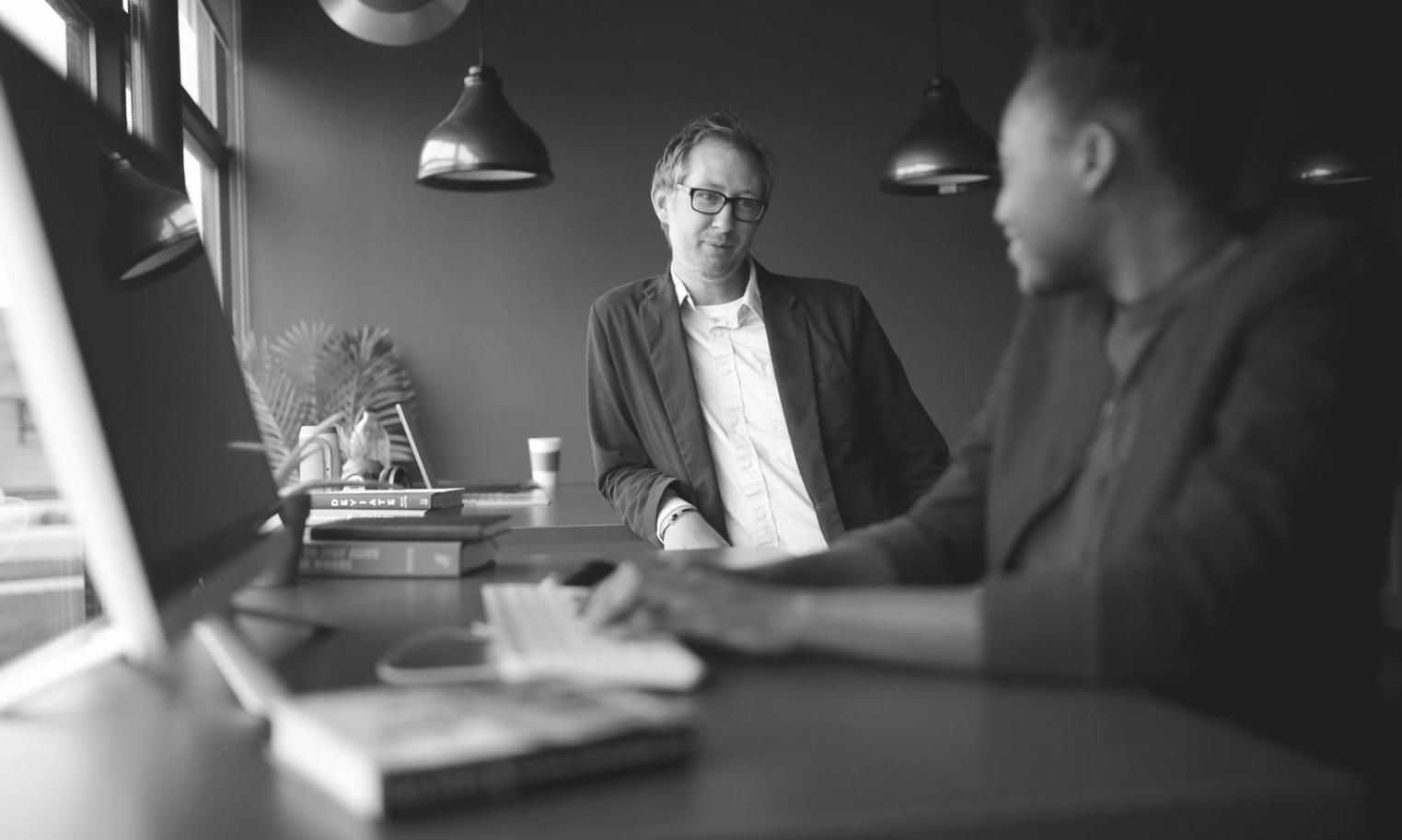 Business owner reviewing financial reports on laptop